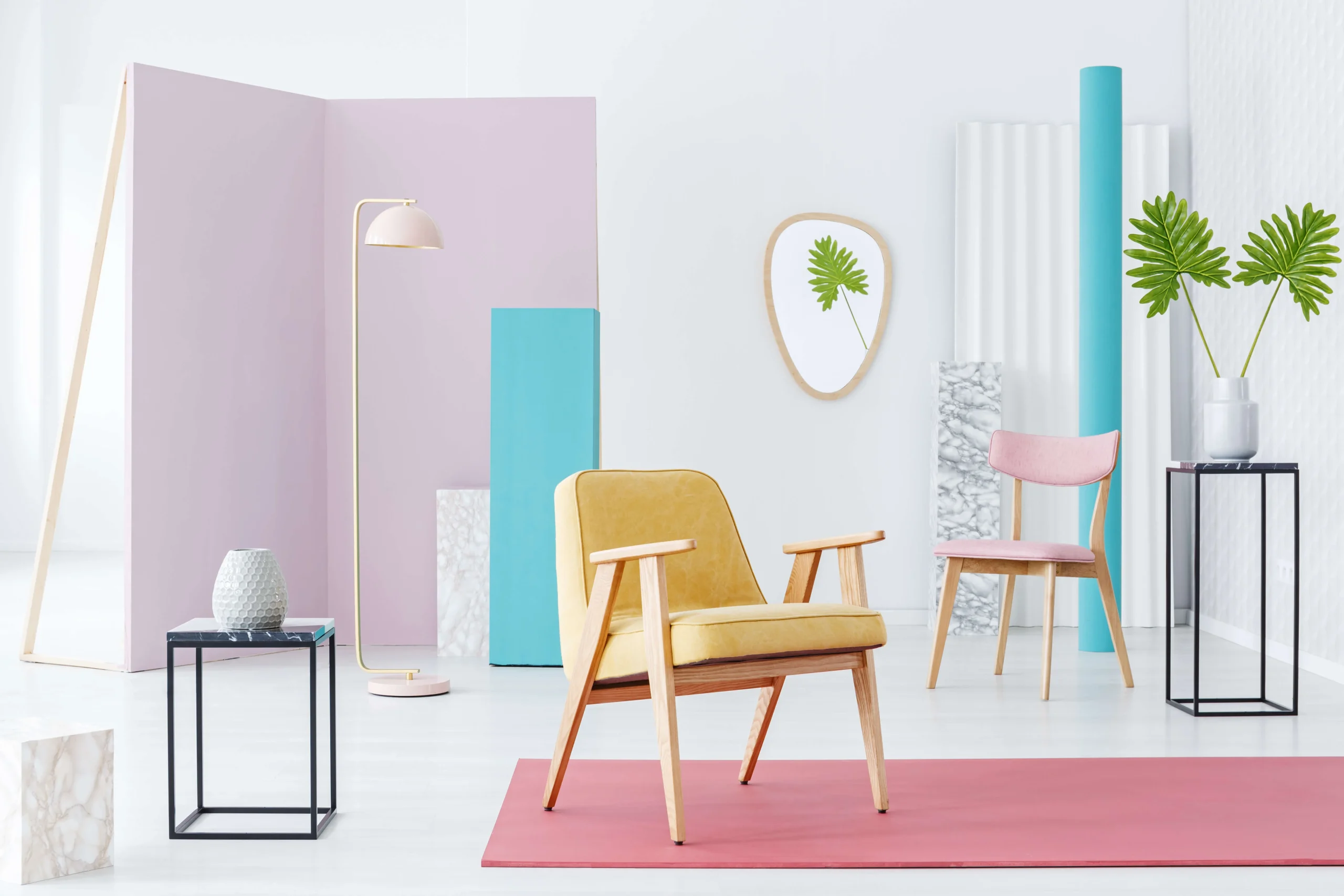 Living room with yellow walls and pink sofa