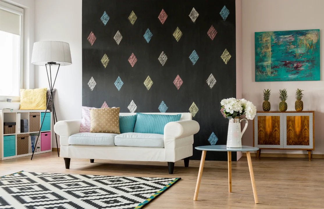 Living Room with dark walls and white sofa
